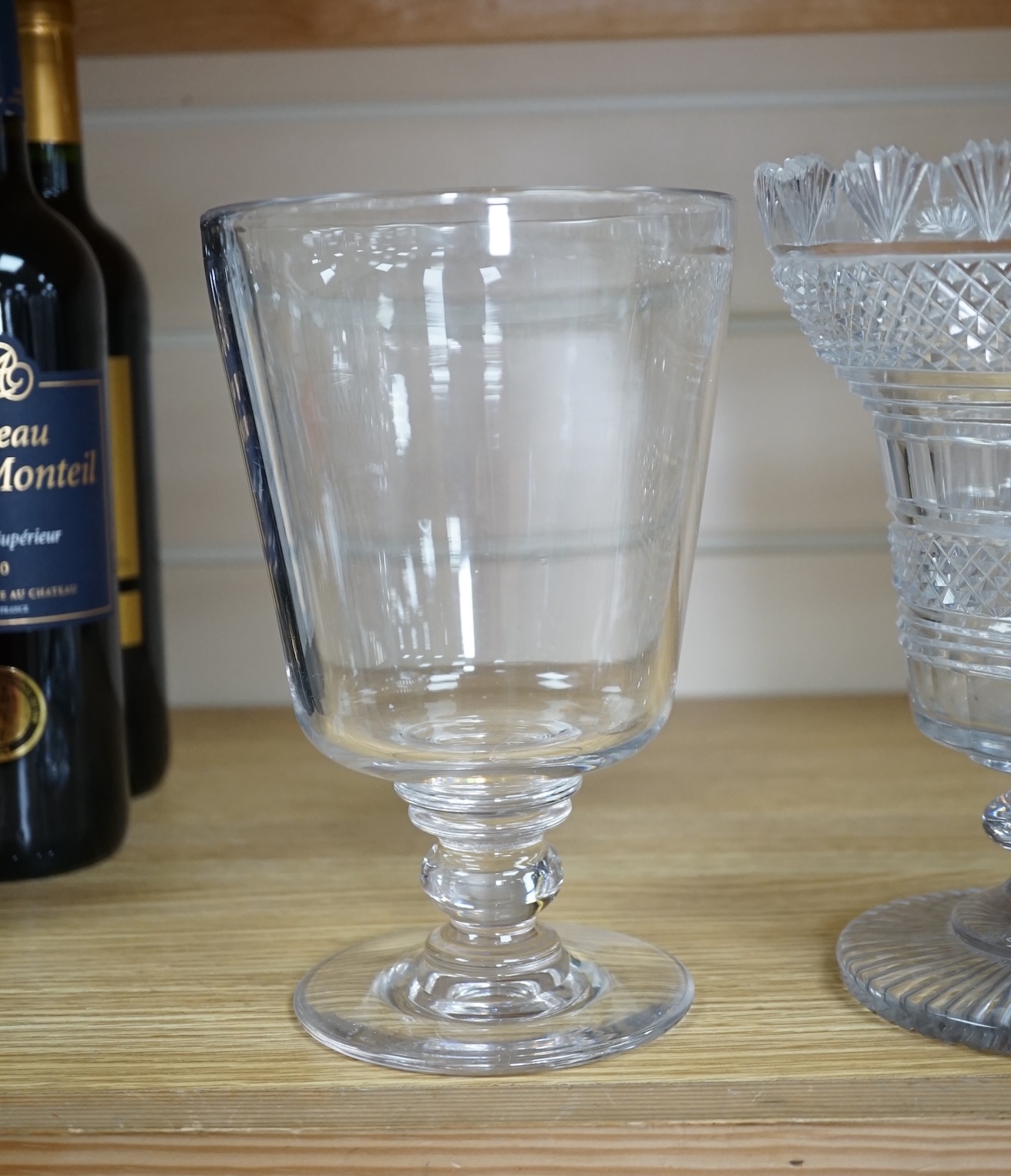 A Regency cut glass vase and a near pair of celery vases, largest 21cm high. Condition - good